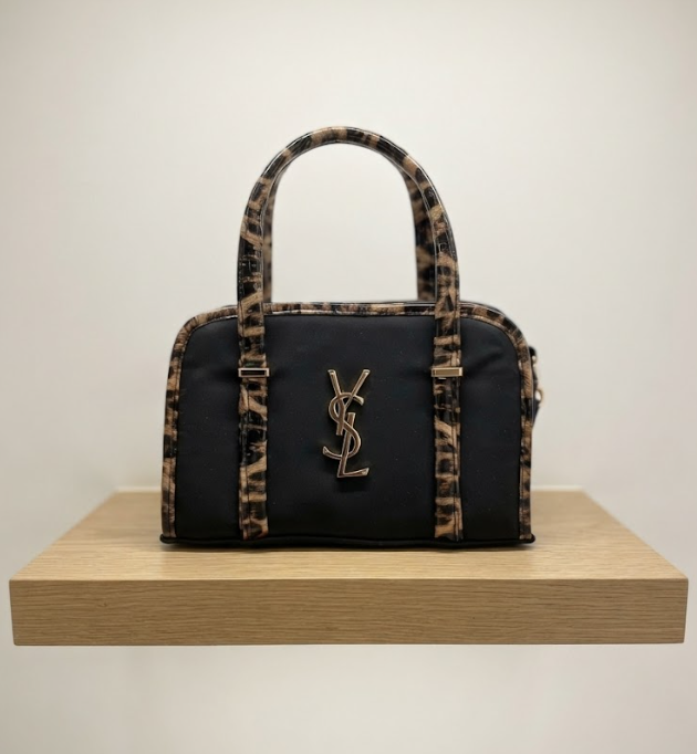 حقيبة "لوبرد نوار" (Leopard Noir Bag) – فخامة الأسود وجرأة النمر
